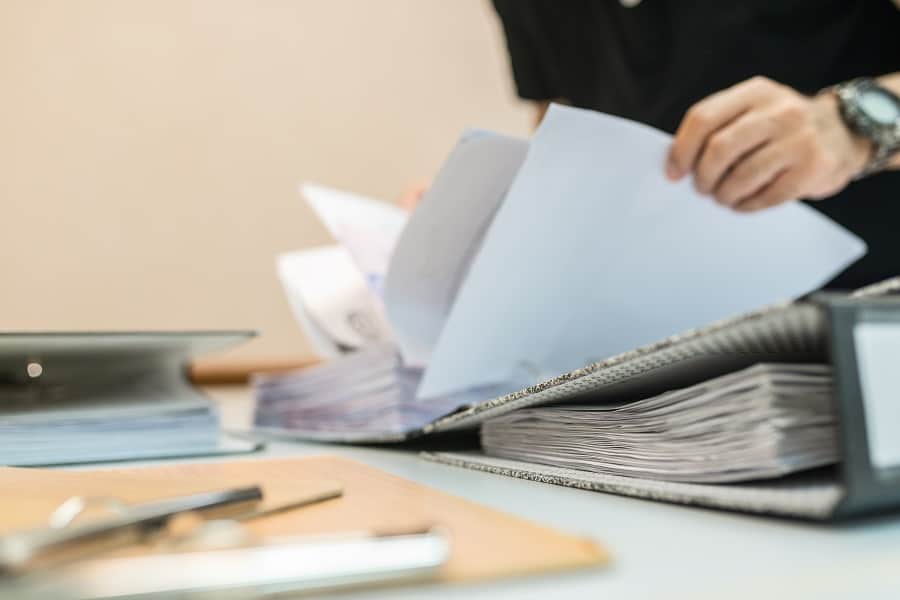 office worker arranging document in the office